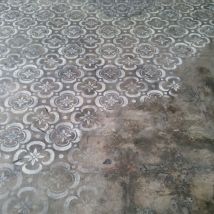 A Stencilled concrete floor found on naturalrugs.com